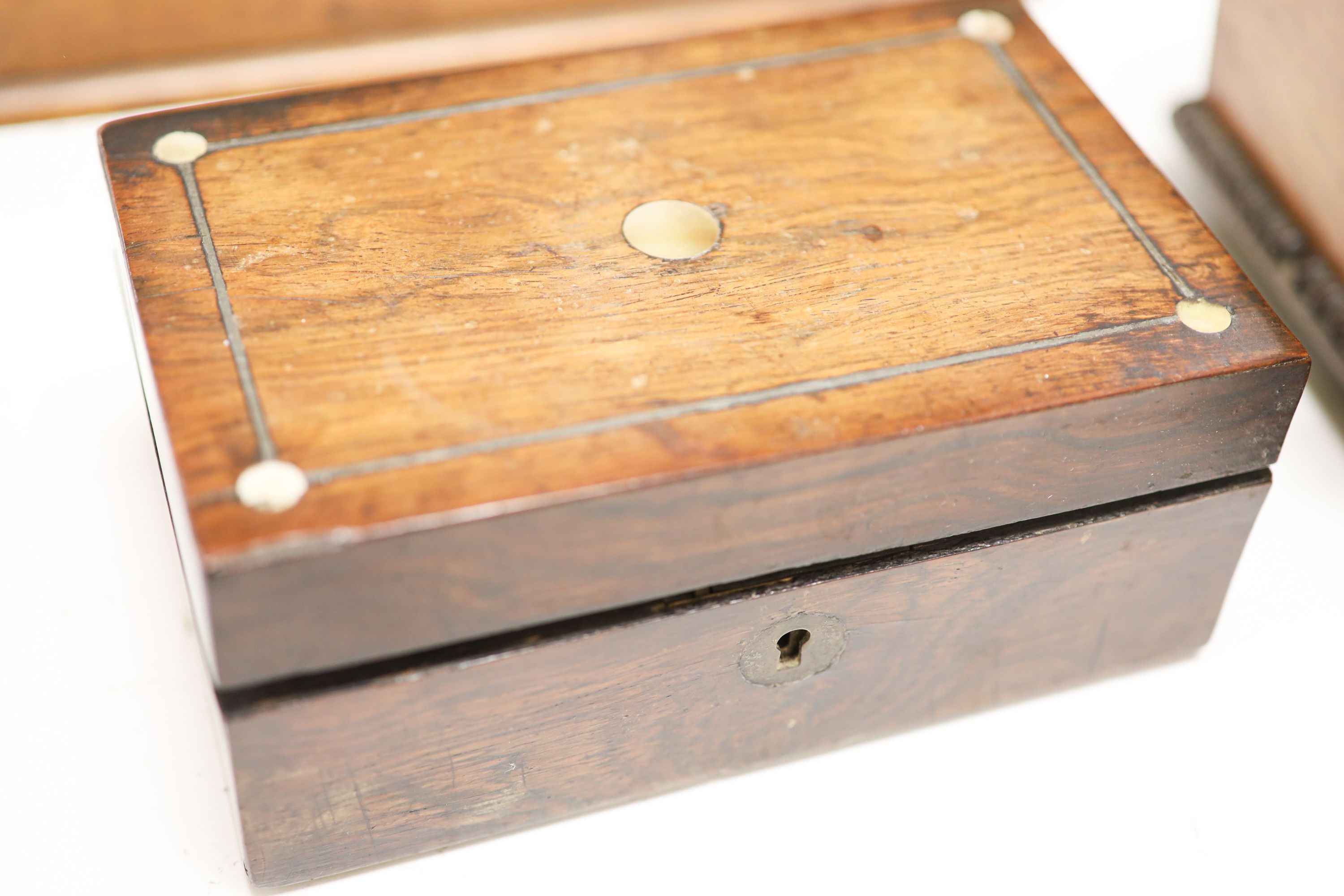 A Regency cut brass inlaid rosewood sewing box and three other boxes